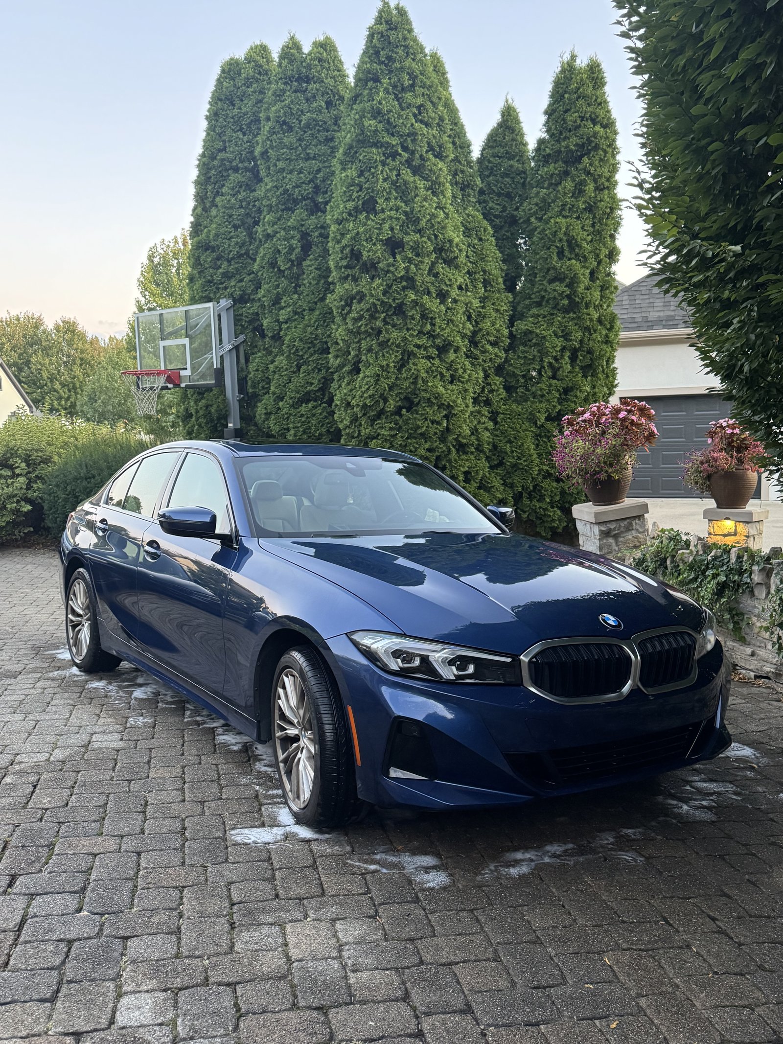 Dark blue BMW 3 Series after an exterior detail